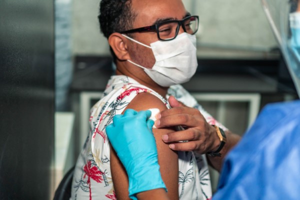 man being vaccinated